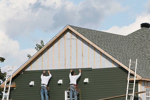 Professional Siding Contractor technician working in Saxton, PA